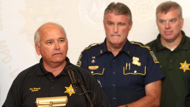 Ouachita Parish Sheriff Jay Russell leads a news conference discussing the Multi-Jurisdictional Task Force, a group of area law enforcement agencies and their recent proactive patrols in Monroe. In the background are Capt. Tommy Lewis, Troop F commander Louisiana State Police and Marc Mashaw, Ouachita Parish chief deputy.