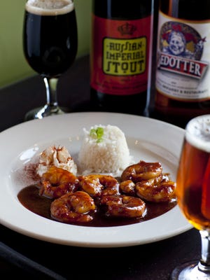 Voorhees Iron Hill Brewery makes a voodoo sauce, marrying barbecue sauce and its Vienna Red Lager for a spicy melange that's featured in its shrimp and chicken pizza dishes.