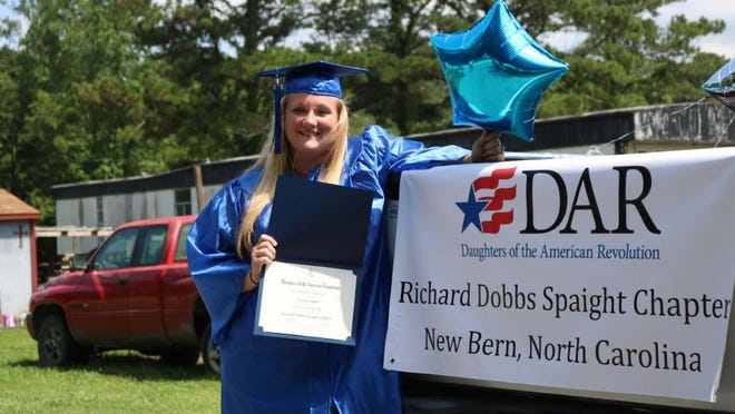 Jessica Amber Baker, an adult student of the Craven CountyFamily Literacy Program earned her 2020 High School Equivalency Diploma this spring. To celebrate her accomplishment, staff of the Vanceboro Family Literacy site organized an end-of-year vehicle parade.During the celebration, Jessica was presented with her High School Equivalency Diploma and with a Scholarship Award from the Richard Dobbs Spaight Chapter of the National Society of the Daughters of the American Revolution. In receiving the scholarship, Jessica was recognized for "her diligence and leadership throughout her enrollment in the adult program of the Craven County Family Literacy Program". The Richard Dobbs Spaight Chapter, NSDAR works to promote literacy in the community in various ways, including partnering with other literacy-focused organizations. For information on the Richard Dobbs Spaight Chapter, NSDAR, please contact DARRichardDobbsSpaight@gmail.com.
