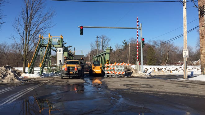 State Department of Transportation crews work on the closed Park Avenue bridge in Brockport earlier this month.