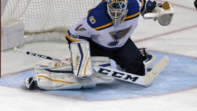 St. Louis Blues goalie Carter Hutton (40) guards the goal against the Anaheim Ducks in the second period of an NHL hockey game in Anaheim, Calif., Sunday, Jan. 15, 2017. (AP Photo/Reed Saxon)
