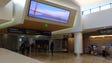 Fliers enter a San Francisco's new T3E gates underneath this modern-looking opening area.