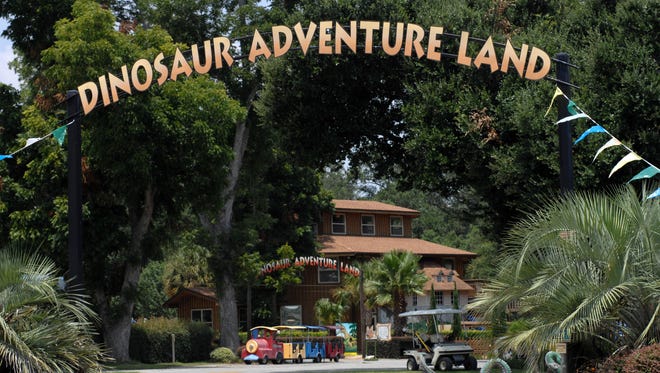 Dinosaur Adventure Land, pictured in 2008, was still open in July despite attempts by the IRS to seize the property for unpaid taxes more than a year after owner Kent Hovind was sentenced to 10 years in federal prison.