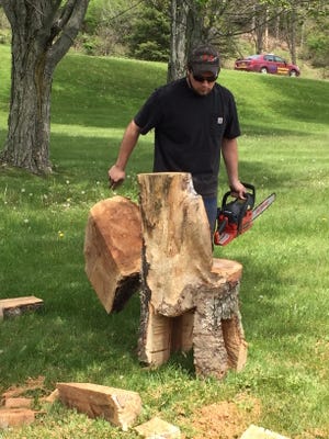 A graduation requirement of English 12 is to give a senior speech and students often choose to demonstrate a skill they’ve learned. One Spencer-Van Etten student chose to do something unusual. Dominick Lanzillotto created a chair from a log using his chainsaw. His English teacher, Rebecca Paasch, was impressed and shared this picture with the staff.