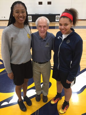 Birmingham Detroit Country Day girls basketball coach Frank Orlando poses for a picture with senior Tylar Bennett, left, and senior Miss Basketball finalist Destiny Pitts on Wednesday.