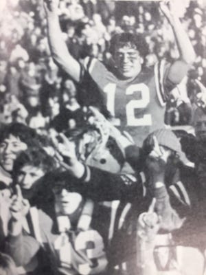 The Pleasant Spartans celebrate after winning the 1972 Class A state championship 20-14 over Lorain Clearview at Ohio Wesleyan. It was the first-ever state title determined in a playoff in Ohio.