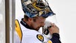 Nashville Predators goalie Pekka Rinne (35) wipes his
