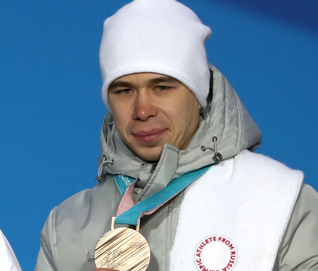 From left, silver medalist Sjinkie Knegt of the Netherlands, gold medalist Lim Hyo-jun of South Korea and bronze winner Semen Elistratov of the Olympic Athletes from Russia.