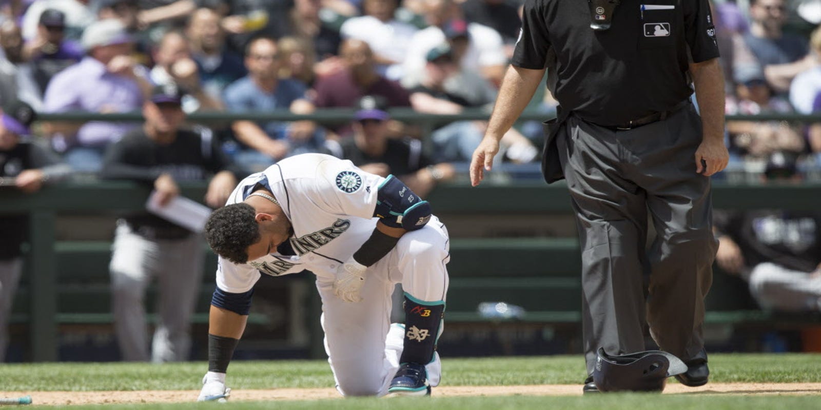 Nelson Cruz Jean Segura Leave Mariners Loss With Injuries