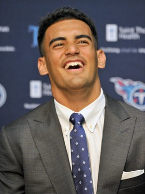 Tennessee Titans first-round draft pick Marcus Mariota laughs during the press conference at Saint Thomas Sports Park.
