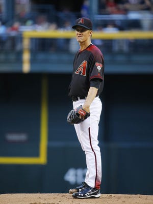 Arizona Diamondbacks starting pitcher Zack Greinke (21) throws against the Chicago Cubs  during the first inning of their MLB game Saturday, April 9, 2016 in Phoenix,  Ariz.