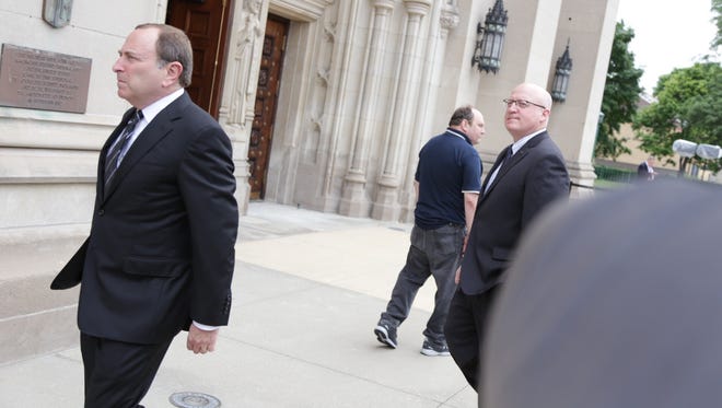 NHL commissioner Gary Bettman arrives for Gordie Howie's funeral at the Cathedral of the Most Blessed Sacrament in Detroit on Wednesday, June 15, 2016.