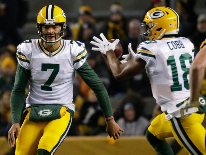 Green Bay Packers quarterback Brett Hundley (7) pitched