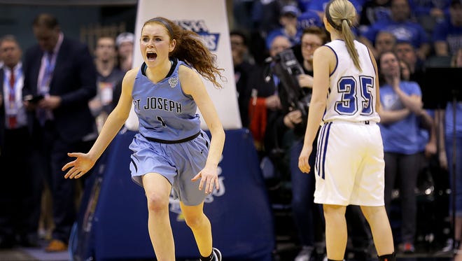St. Joseph Indians Daly Sullivan (1) celebrates their win in the IHSAA 3A Girls Basketball State Finals game Saturday, February 25, 2017, evening at Bankers Life Fieldhouse. The St. Joseph Indians  defeated the North Harrison Lady Cats 57-49.