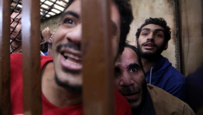 Egyptian Defendants React After A Court Cleared 26 Men Who Had Been