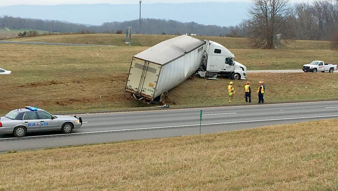 A tractor-trailer rests in the median after being involved in a wreck involving two tractor-trailers at mile marker 217 on Interstate 81 at Mint Springs on Friday, Jan. 8 2016. 