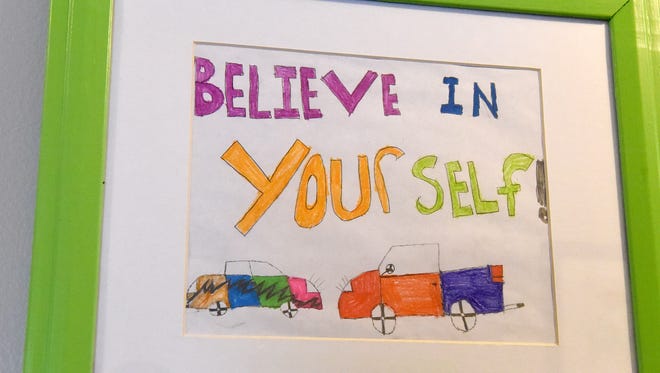 Drawn by a child, framed artwork displayed in a hallway encourages people to "Believe In Yourself!" at the Valley Children's Advocacy Center in Staunton.