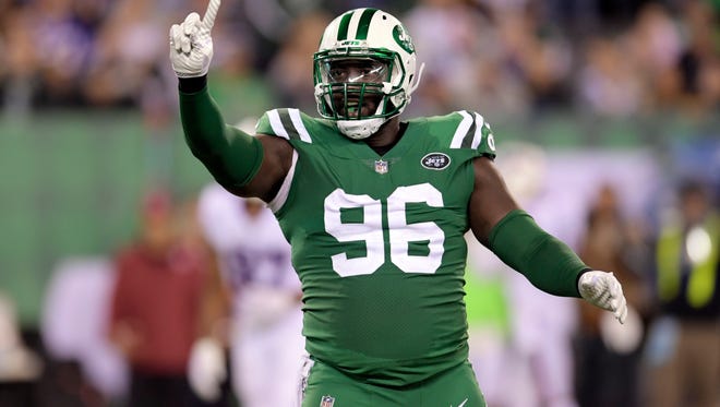 New York Jets defensive end Muhammad Wilkerson gestures after a play against the Buffalo Bills during the second half of an NFL game Nov. 2, 2017, in East Rutherford, N.J.