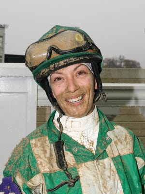 Oriana Rossi was still smiling after eating a lot of dirt during a race at Churchill Downs on Thanksgiving Day, 2011.