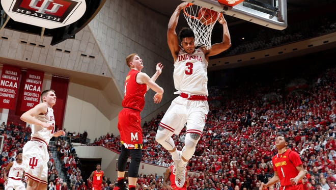Indiana Hoosiers forward Justin Smith (3) dunks against Maryland Terrapins guard Kevin Huerter (4) during the first half at Assembly Hall.