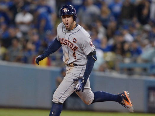Game 2 at Dodger Stadium: George Springer rounds the
