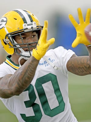Green Bay Packers running back Jamaal Williams (30) does a ball drill during practice inside the Don Hutson Center Wednesday, November 15, 2017 in Ashwaubenon, Wis.