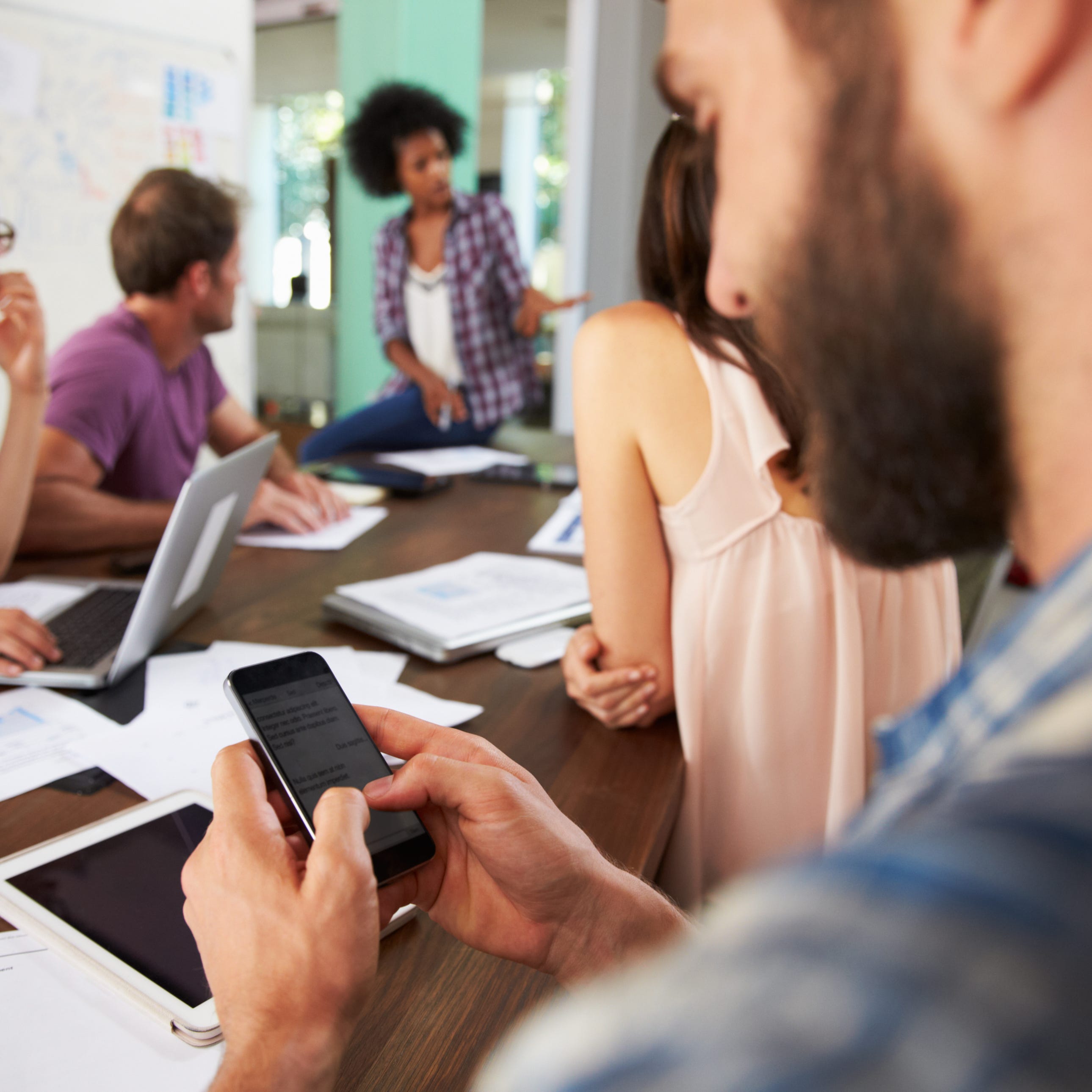 If you're texting at a meeting, you're sending the wrong message.