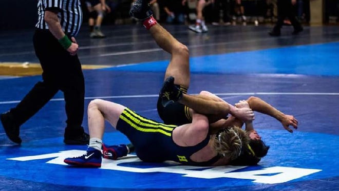 Kyle Kantola (lower) is 27-1 on the season with 26 of his victories coming via fall.