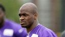 FILE - In this July 28, 2014, file photo, Minnesota Vikings running back Adrian Peterson looks on during NFL football training camp in Mankato, Minn. Peterson acknowledges he struck his young son with a branch, but insists he did not commit a crime. That belief is to draw further attention this week when the case against the Vikings' star running back goes before a Texas judge.  (AP Photo/Charlie Neibergall, File)
