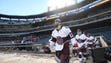 Will Forteescue of Don Bosco walks onto the field and