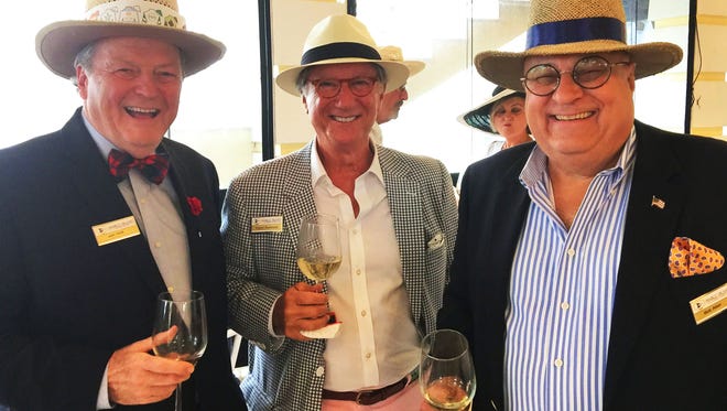 Everyone dressed for the “Hats and Horses” Derby Day event at the Yacht Club, including, from left, Jon Holt, Kevin Kennedy and Bob Aber.