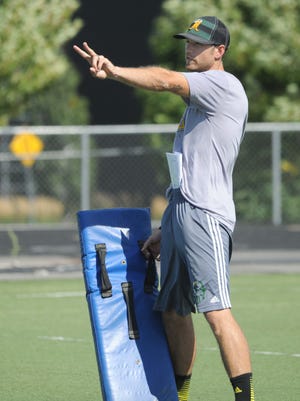 Bishop Manogue  football coach Thomas Peregrin announced he will resign