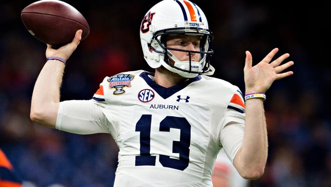 Auburn quarterback Sean White (13) throws a pass before the Sugar Bowl between Auburn and Oklahoma on Monday, Jan. 2, 2017, at the Super Dome in New Orleans, La. 