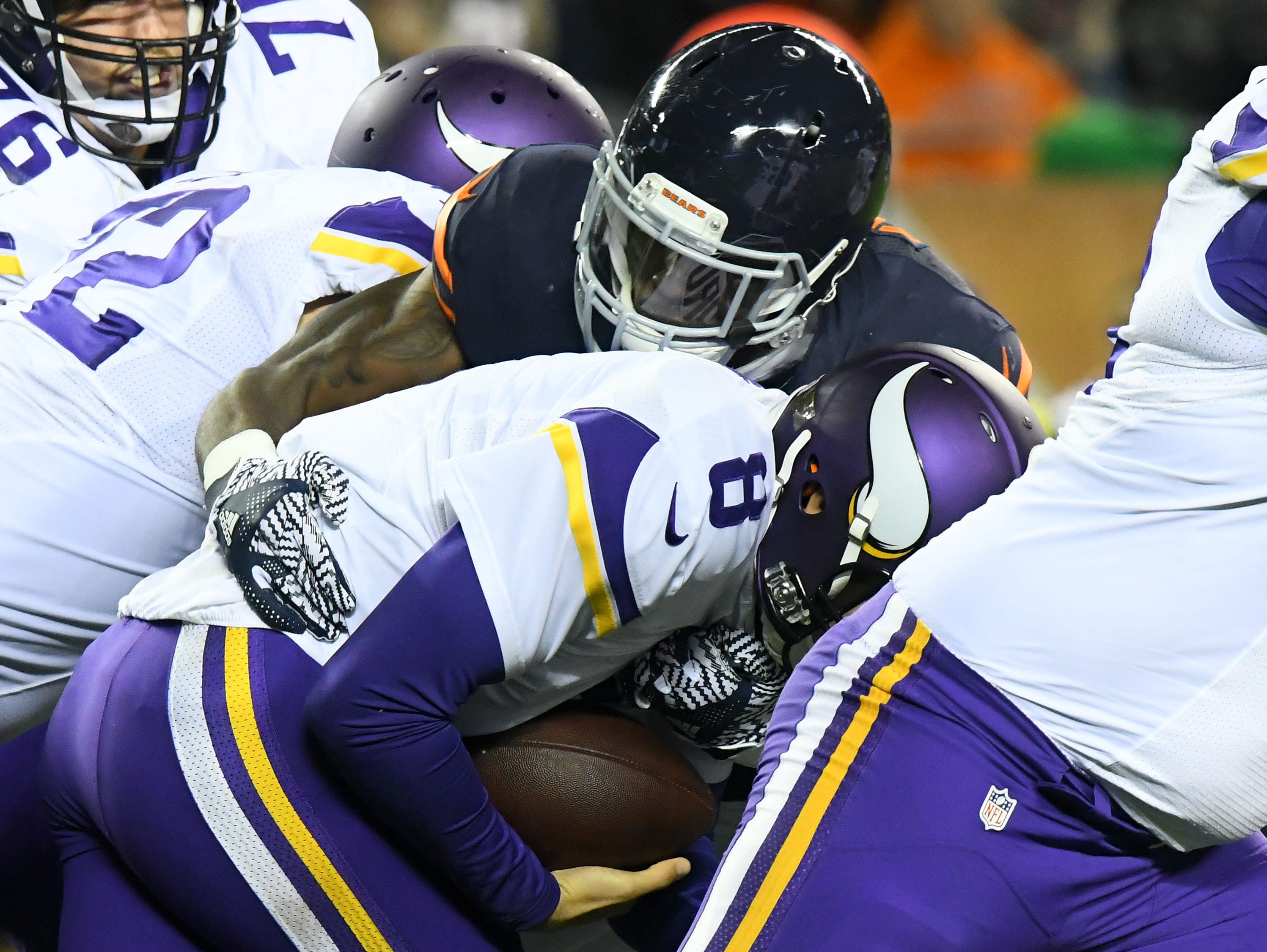 Vikings QB Sam Bradford (8) was once again under fire Monday night.