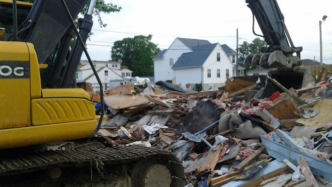 A Union Beach home was reduced to rubble Monday after it collapsed during an elevation project. Records show one of the contractors involved was not licensed to do home improvement work in New Jersey.