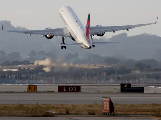 A Delta Air Lines Boeing 757 takes off from San Francisco