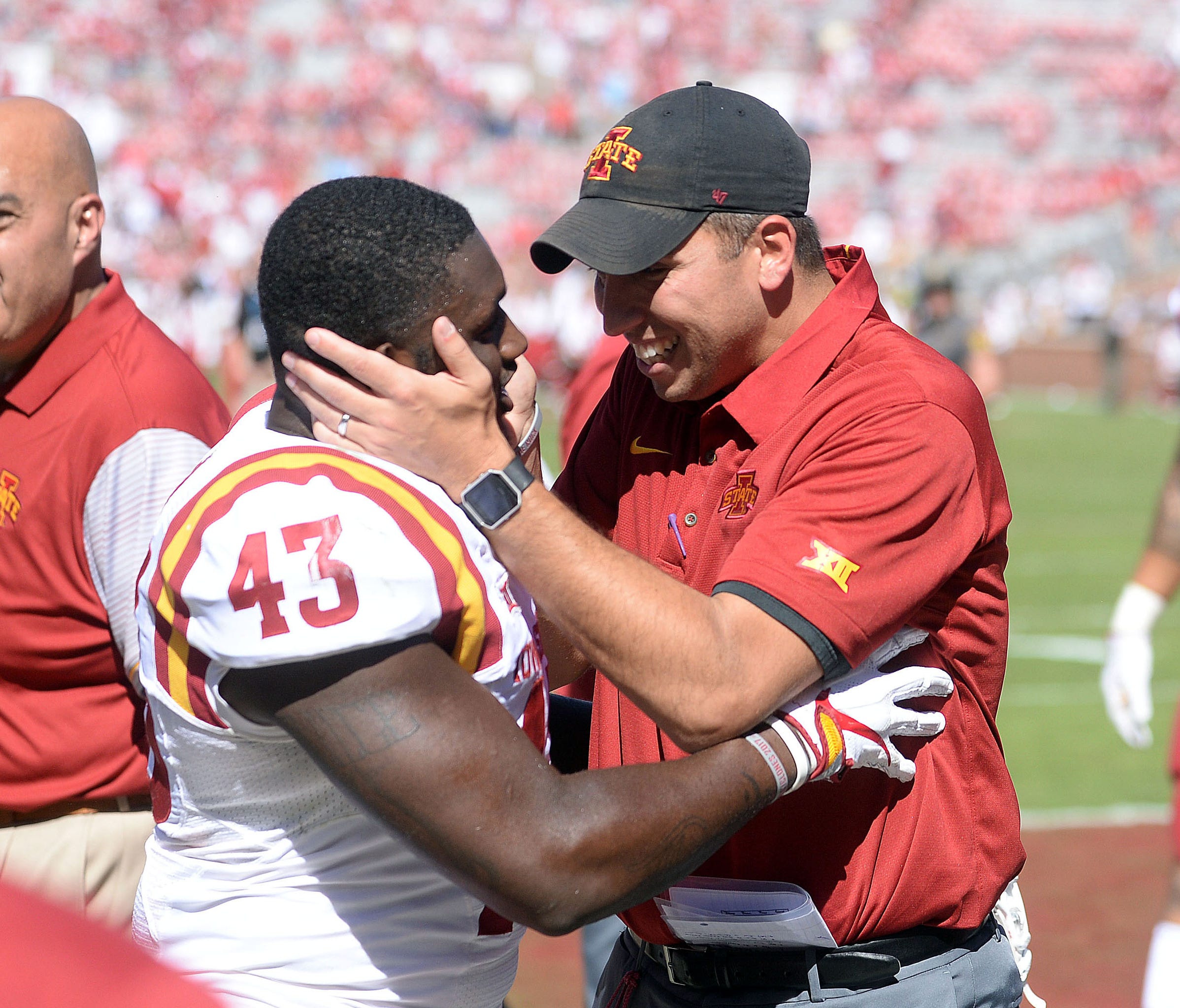 Iowa State Cyclones head coach Matt Campbell and running back Logan Redeker.