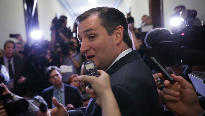Ted Cruz speaks to members of the media outside his office at the Senate Russell Office Building in May 2016.
