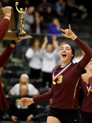 Harrisburg Samantha Slaughter rejoices after defeating Roosevelt to win the S.D. State AA Volleyball championship at the Swiftel Center in Brookings.