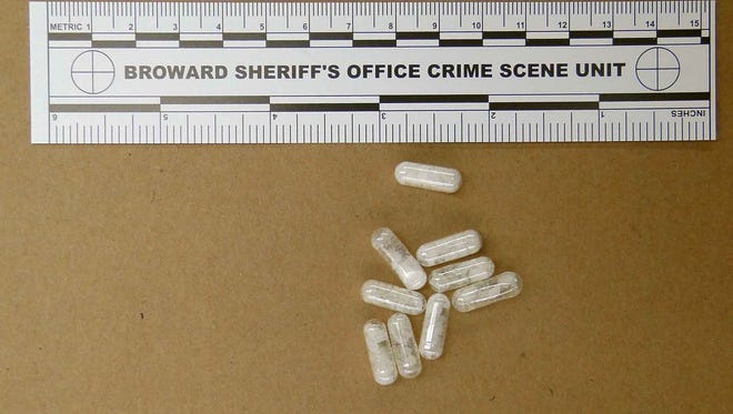 This Feb. 12, 2015 photo made available by the Broward Sheriff's Office, Fla.,  shows confiscated vials of flakka. This emerging drug can alter brain chemistry in such a way that users can't control their thoughts and it can increase adrenalin. (AP Photo/Broward  Sheriff's Office via AP)                          