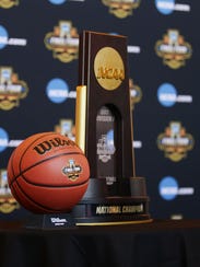 Final Four ball and National Champion trophy during