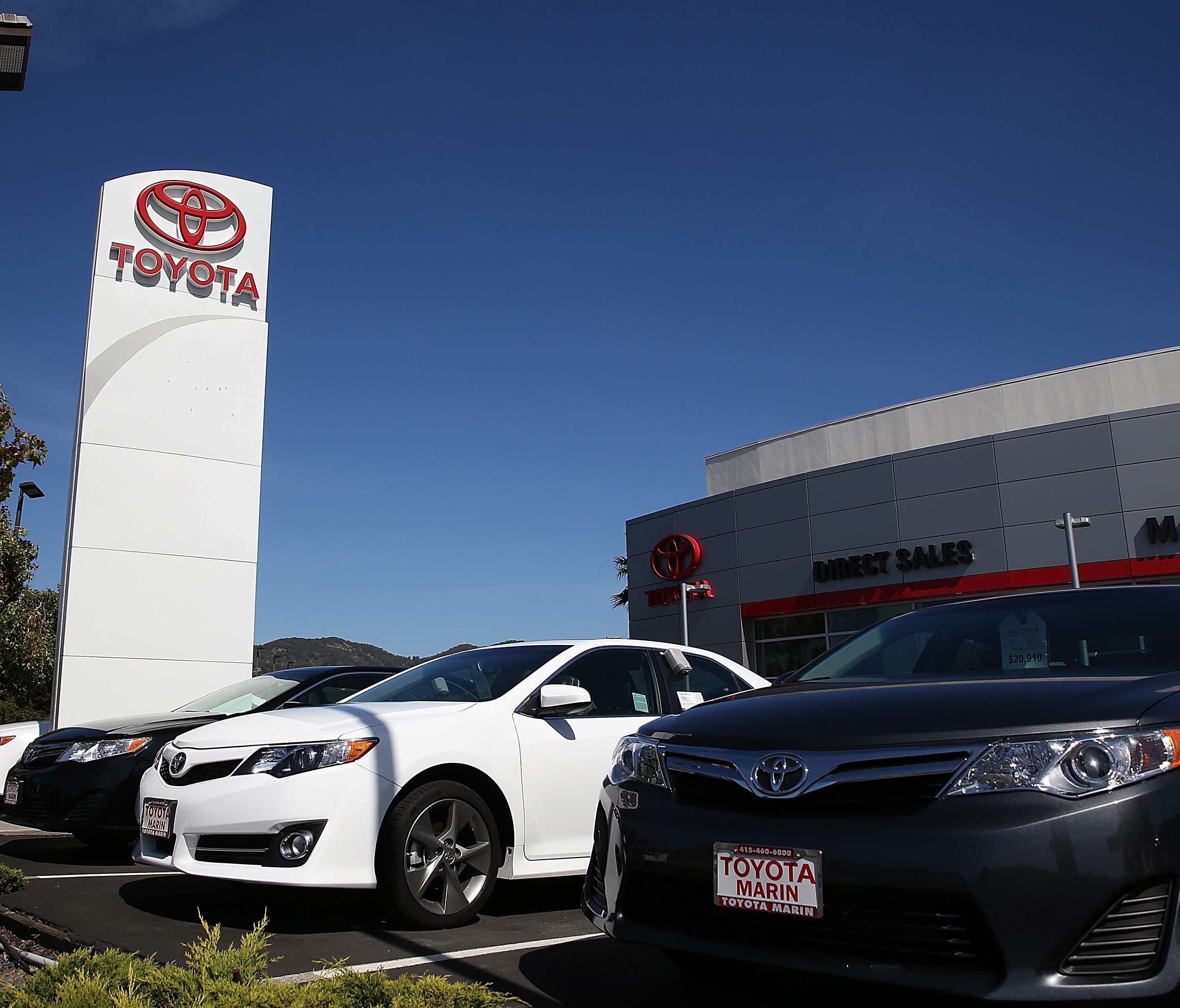 Toyota cars are displayed at Toyota Marin in San Rafael, Calif., in this 2013 file photo