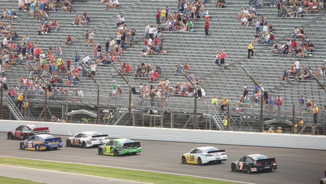 FILE - Sparse crowd in turn one of the  Brickyard 400 at the Indianapolis Motor Speedway on July 28, 2013.
