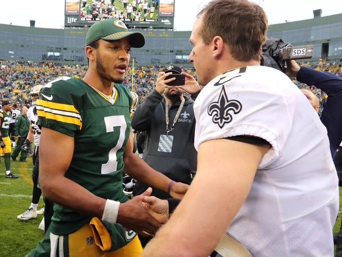 Green Bay Packers quarterback Brett Hundley (7) greets
