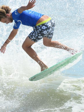 Blair Conklin, Laguna Beach, Ca, catches a wave during the Men's Pro Division heat in the semifinals of the Skim USA Association ZAP Pro/Am Skimboarding Competition in Dewey Beach, De. on Friday, August 11, 2017.