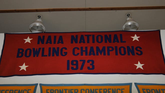 This banner, designating the CGF Argos as 1973 NAIA Bowling Champions, hangs from the rafters at UGF's McLaughlin Center.