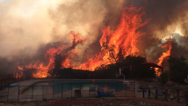 Redding resident Laura McDuffey took this photograph of the fire from her backyard.