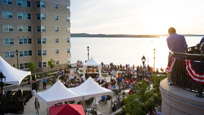 Guests and Madison residents enjoy a beautiful sunset and live music over Lake Mendota during The Edgewater’s Fourth Fest, held each July in Madison.