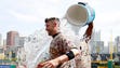 July 20: Chris Stewart of the Pirates has water dumped