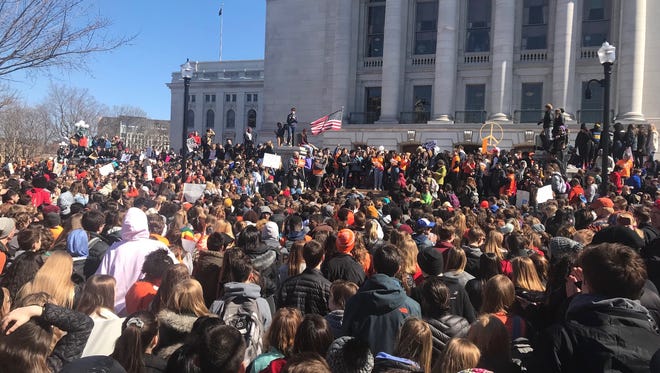 Students gather at the Wisconsin State Capitol in Madison as part of the National School Walkout.